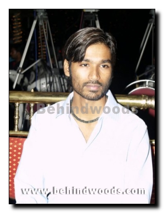 Dhanush and Sneha for Pudupet in Telugu