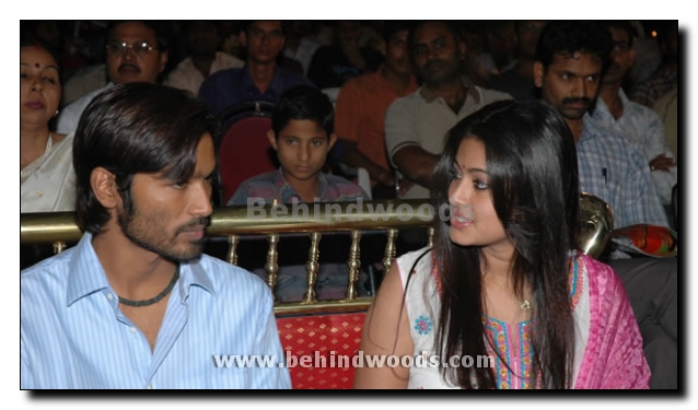 Dhanush and Sneha for Pudupet in Telugu