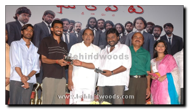 Dhanush and Sneha for Pudupet in Telugu