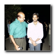 Dhanush and Sneha for Pudupet in Telugu