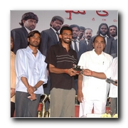 Dhanush and Sneha for Pudupet in Telugu