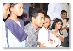 Suriya/Shriya experience the Joy of Giving - images