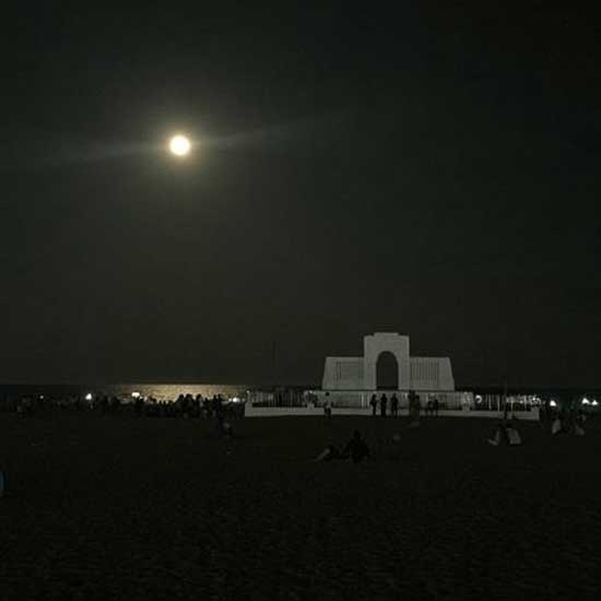 Moon watching along the beach