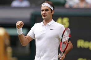 Federer breaks Serena's record for most Grand Slam match wins