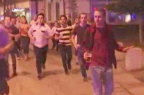 Image shows man fleeing London terror attack site with a ‘pint of beer’ in hand