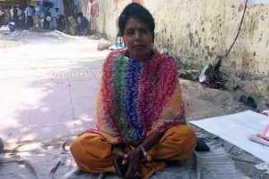 Woman sits in protest to marry PM Modi