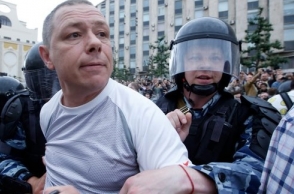 Russia arrests 1,500 anti-corruption protesters