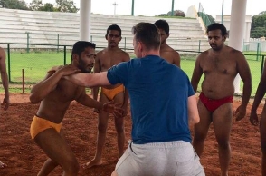 Brett Lee takes part in Indian style wrestling