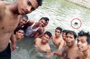 Friends take group selfie, while boy drowns and dies