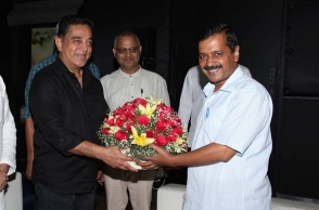 I am happy to join hands with Kamal: Kejriwal