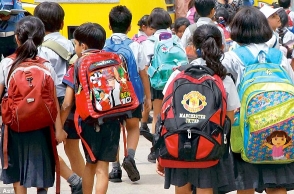 Telangana govt caps weight of school bags for school students