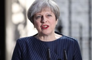 Theresa May apologises for election 'mess'