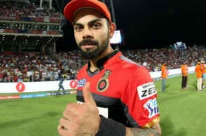 Virat Kohli gives his match trophy to fan in stands