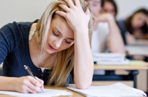Cambridge plans to scrap written exams over bad handwriting