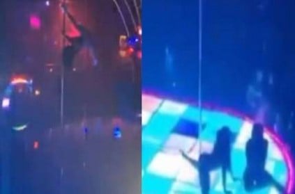 Stripper Falls From 15-Foot Pole Continues Dancing In Viral Video