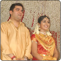 Santhosh Menon & Navya Nair 