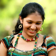 lakshmi-menons-quick-promotion-from-school-to-college-photos-pictures-stills