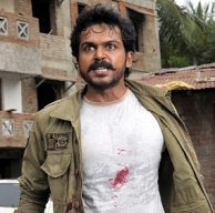 Karthi does a dual role yet again