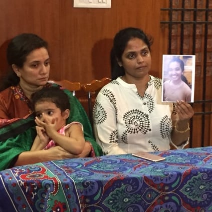 Image result for Lalitha Kumari holding up a picture of her missing niece