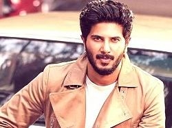 Dulquer Salmaan has a Tamil New Year's present for you. Wonder what it is? Watch video!