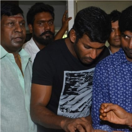 Kathi Sandai shooting halted on 17th July on account of the death of lightman named Selvam