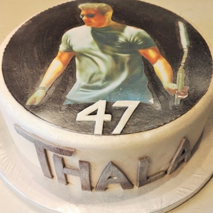 Serge Crozon's wife prepares a special cake for Ajith birthday