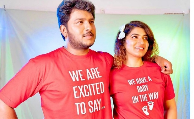popular vijay tv real pair promoted as parents விஜய் டிவி தம்பதி வீட்டில் குவா குவா