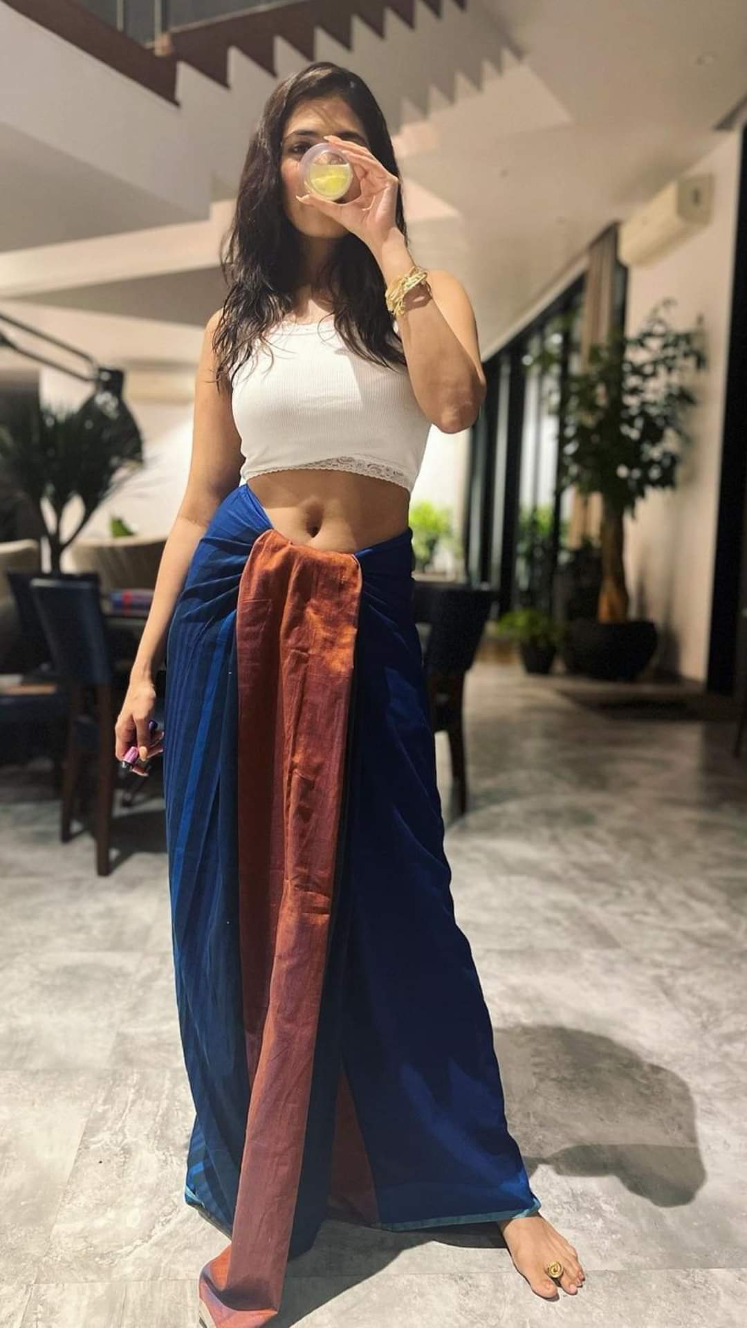 Malavika Mohanan Instagram post about Wearing Veshti At home