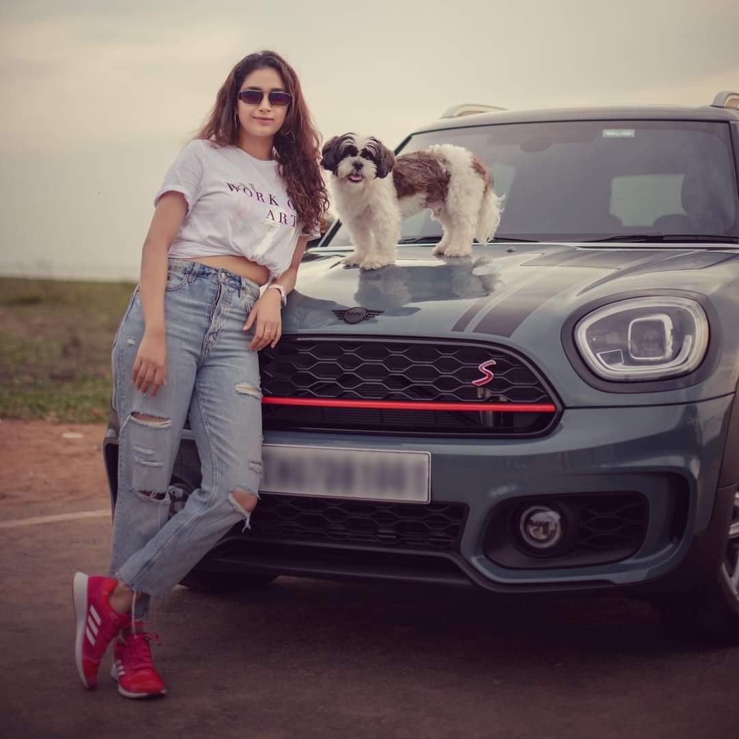 Keerthy Suresh with her dog in Mini Cooper Countryman