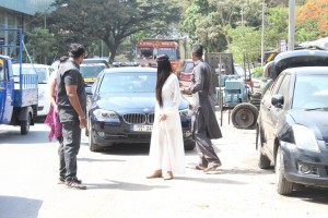 Poonam Pandey Distribute Raincoats To Street Children