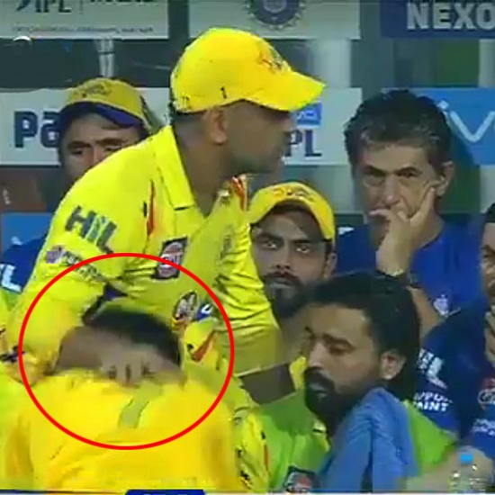 During CSK vs KKR match in 2018, a fan breached security to reach Dhoni at the dugout to touch his feet