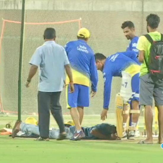 During a practice session in Chennai, a fan ran into the field to touch Dhoni's feet