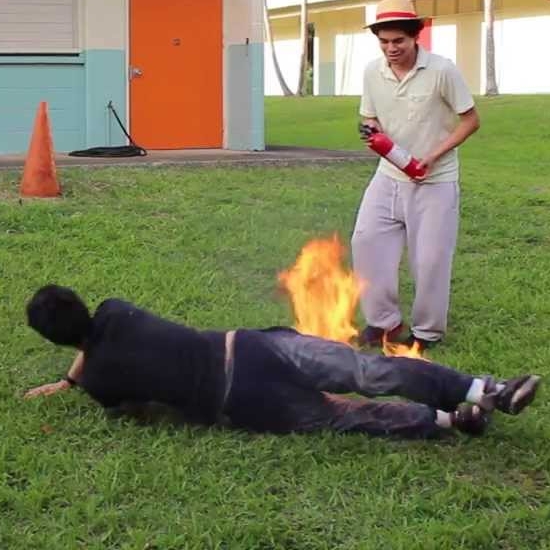 Drop to the floor; the fire can reach your face faster if you are standing (DROP).