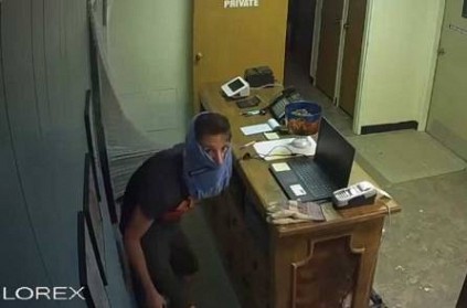 Watch: Burglar uses underwear to cover face