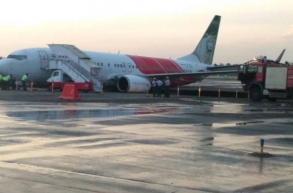 Air India express drifts off taxi way