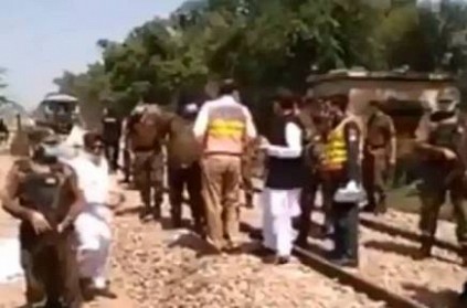 bus carrying sikh pilgrims hit by train in punjab 19 killed Pak
