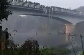 Horrific: Bus crashes through bridge, falls into river