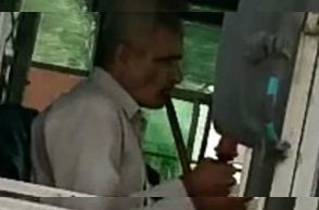 Bus driver smokes hookah while on the wheels