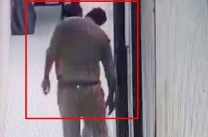 cop suspended for kissing unknown woman in UP