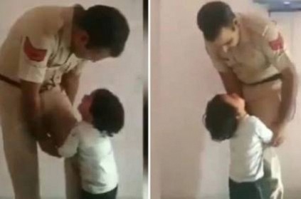 Crying son stops policeman father from going to work: Video Goes Viral