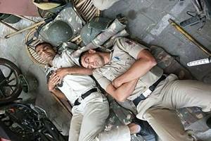 Heartbreaking Image of Policemen sleeping on the road goes viral: “Proud of these Corona Warriors,” says AP’s DGP
