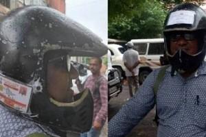 Photos Viral: Man Pastes All Bike Documents On Helmet; No 'FINE' Now   