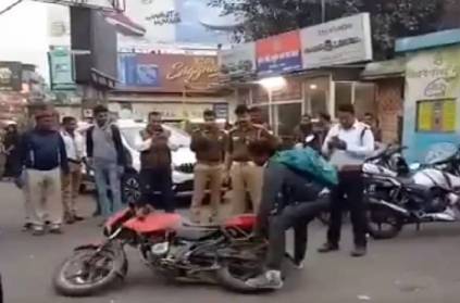 Man throws bike after being fined for not wearing helmet: Watch 