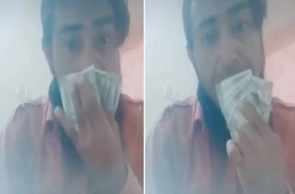 man wipes nose mouth with currency note gets detailed by police