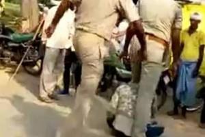Watch Video: Two Policemen Brutally Thrash Man, Child Watches, Ask Forgiveness 