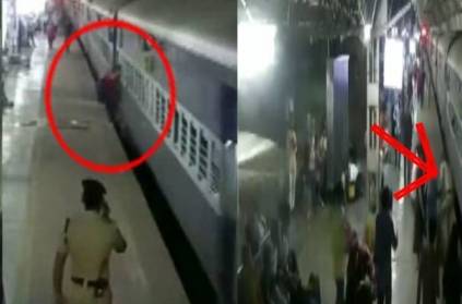 The woman tried to board the moving train and ended up falling