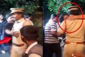 Video of man dragging a policeman and "kissing" him goes viral!