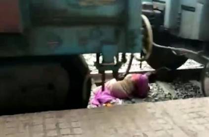 VIDEO: Woman escapes death after moving train crosses her