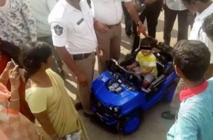 Vijayawada - 5-yr-old rides toy car into busy road