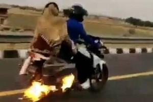 Watch video: Police chases down bike on fire, saves family!